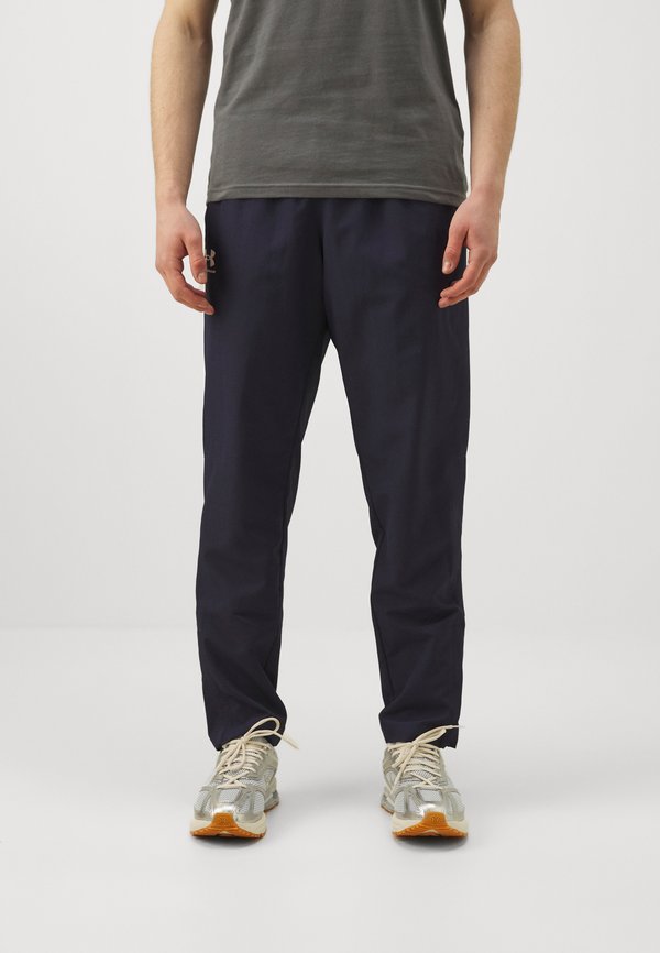 Under Armour RIVAL WOVEN - Outdoor trousers - midnight navy/white
