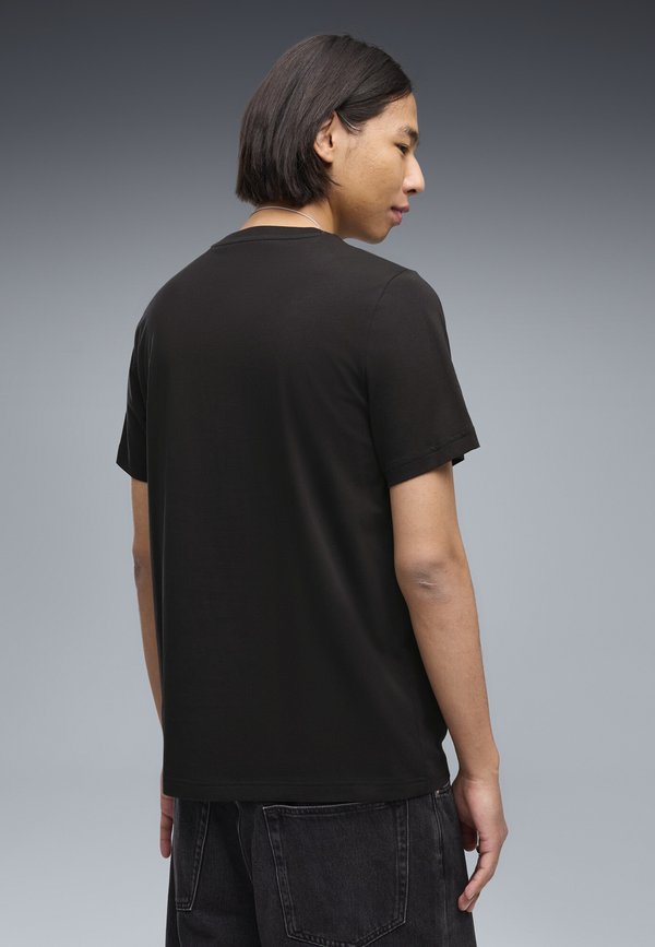Puma GRAPHICS CYBER PUMA T-SHIRT - Print T-shirt - black