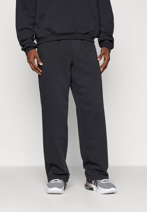 Nike Performance OPEN HEM PANT - Tracksuit bottoms - black/pale ivory
