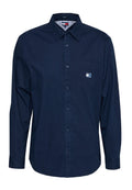 Navyblaues Langarmhemd mit Knopfleiste, Kragen und Brusttasche mit kleinem Tommy Jeans Logo-Patch.