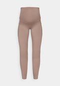 Schwangerschaftsleggings aus weichem, dehnbarem Stoff, mit einem hohen Bund und zwei Seitentaschen. Die Farbe ist ein sanftes Beige mit einer glatten Textur.