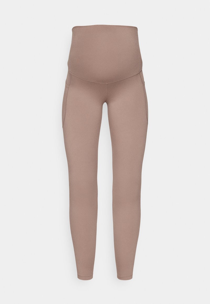 Schwangerschaftsleggings aus weichem, dehnbarem Stoff, mit einem hohen Bund und zwei Seitentaschen. Die Farbe ist ein sanftes Beige mit einer glatten Textur.