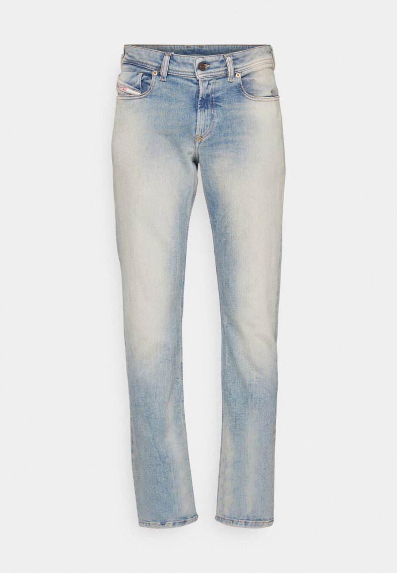 Hellblaue Jeans aus Denim mit einem verblassten Finish, fünf Taschen und einem Knopfverschluss. Gerader Schnitt mit dezentem Used-Look und Nähdetails.