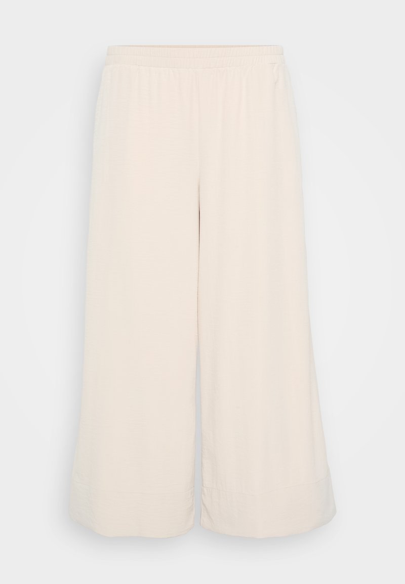 Helle beige weit geschnittene Hose aus weichem Stoff. Verfügt über einen elastischen Bund und eine glatte Textur. In Knöchellänge geschnitten.