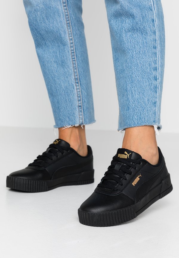 Puma CARINA  - Trainers - black/team gold