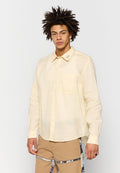 Helles gelbes Langarmshirt aus leichtem Stoff, mit einer Brusttasche, Knopfverschluss und Logodetail am Kragen.