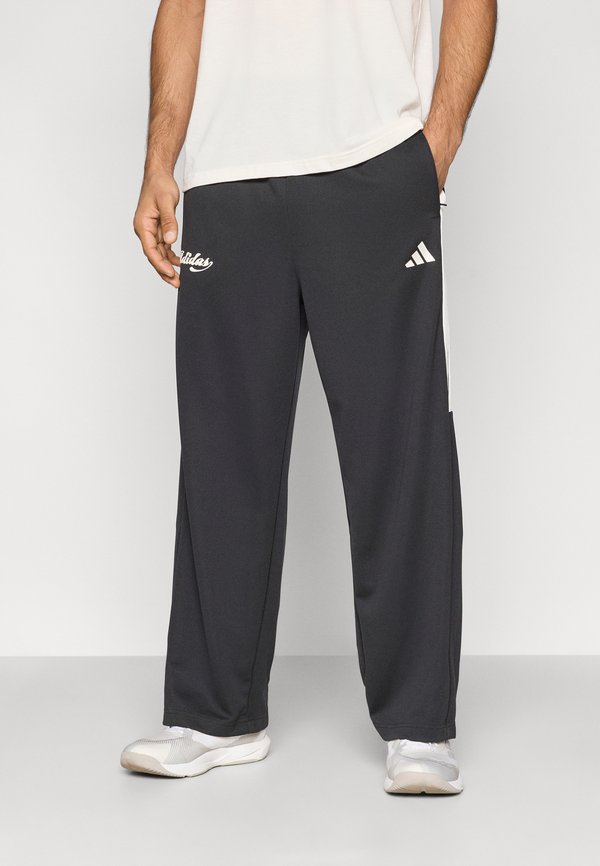 adidas Sportswear HOUSE OF TIRO X COMMON GOAL - Tracksuit bottoms - black/off white