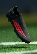 adidas Performance F50 LEAGUE LACELESS - Football boots artificial grass - core black/lucid red/core black