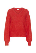 Roter Strickpullover mit V-Ausschnitt, überschnittenen Schultern und gerippten Bündchen. Das Material wirkt weich mit einer leicht strukturierten Oberfläche. Verkürztes Design.
