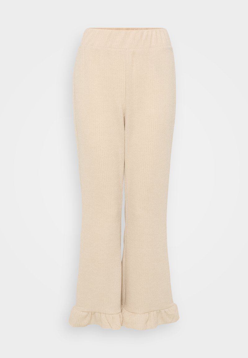 Cremfarbene, gerippte Strickhosen mit einem elastischen Taillenbund und einem ausgestellten Saum, der am unteren Rand Rüschendetails aufweist. Glatte Textur.