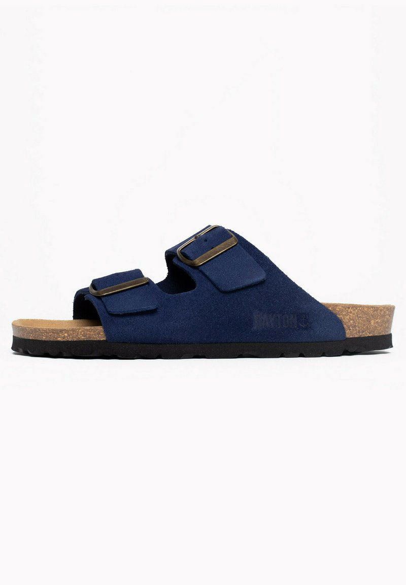 Marineblaue Sandalen mit Korksohle, zwei verstellbaren Schnallen und einem Obermaterial aus strukturiertem Stoff. Ergonomisch geformtes Fußbett mit schwarzer Gummisohle.