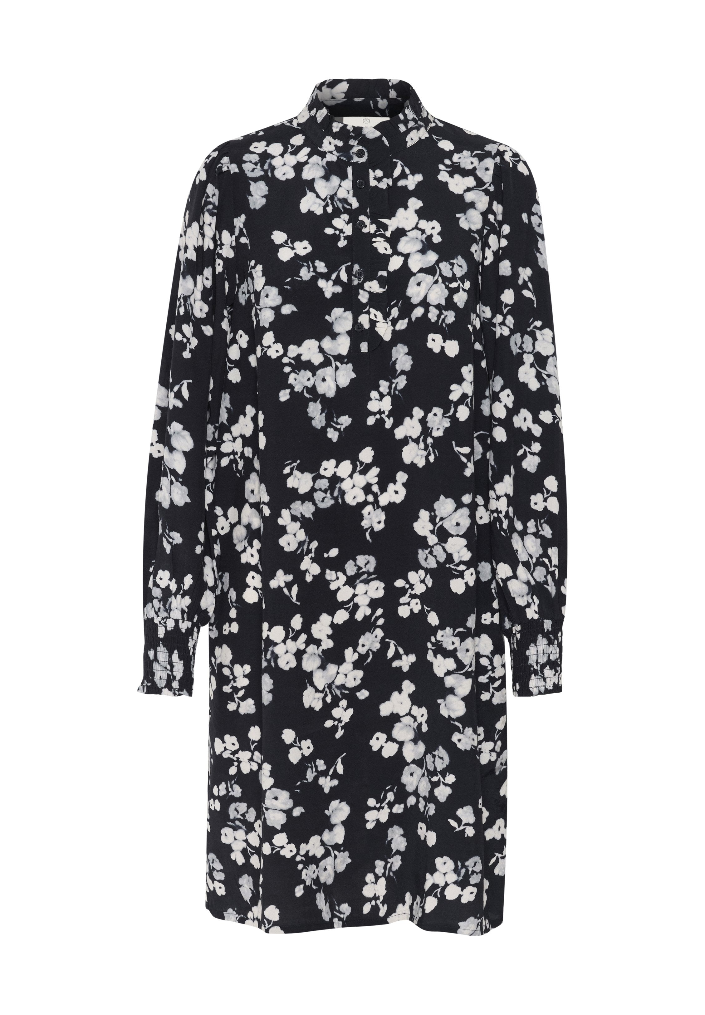 Blumenkleid mit schwarzem Grund und weißen Blumen, langen Ärmeln, Kragen und Knopfdetails. Leichter Stoff mit lockerer Passform.