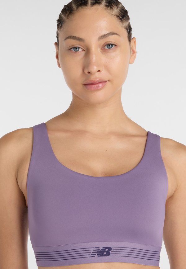 New Balance AC TRAIN BRA - Medium support sports bra - candied violet aa