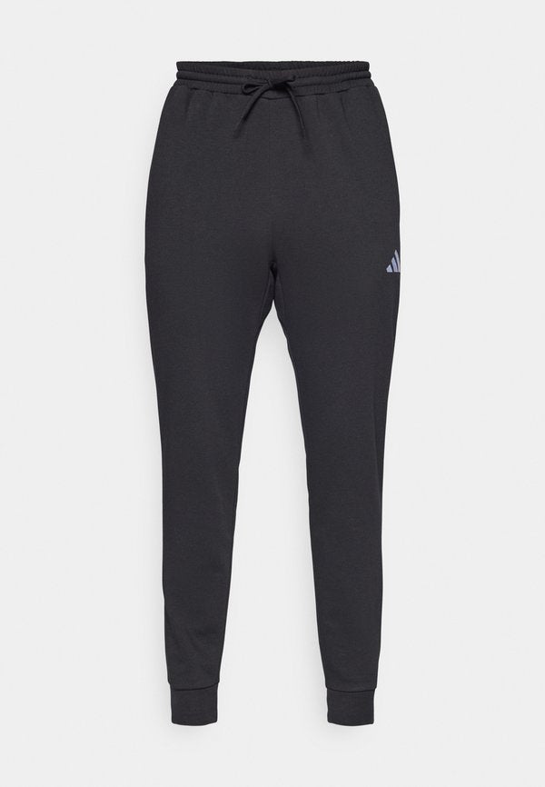 adidas Sportswear ESSENTIALS FEELCOZY FLEECE - Tracksuit bottoms - black/white