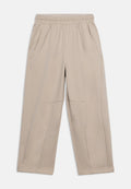 Beige Hosen mit weitem Bein, elastischem Bund und seitlichen Taschen, für die Freizeit konzipiert.