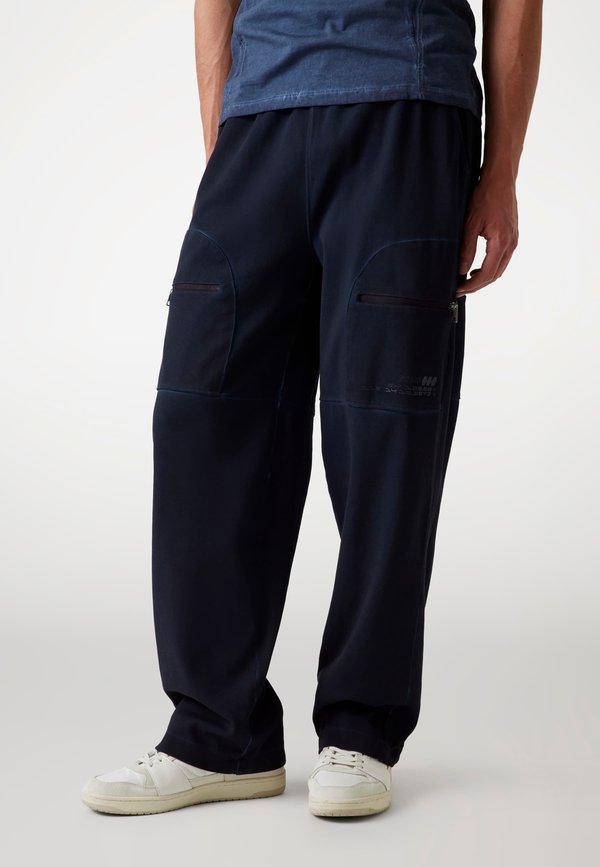 Guess WIDE - Tracksuit bottoms - dunkelblau