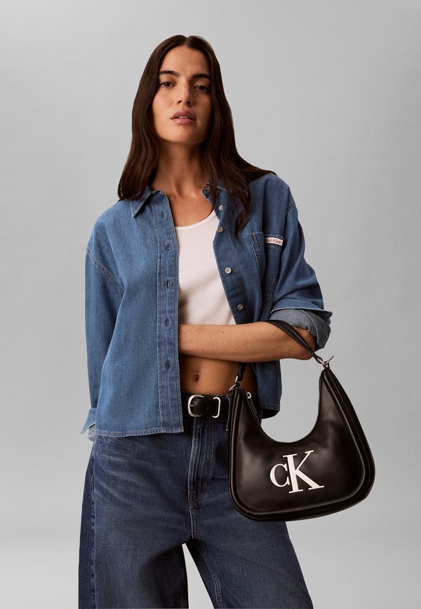 Calvin Klein BOLD SMALL CRESCENT BAG - Handbag - black/white