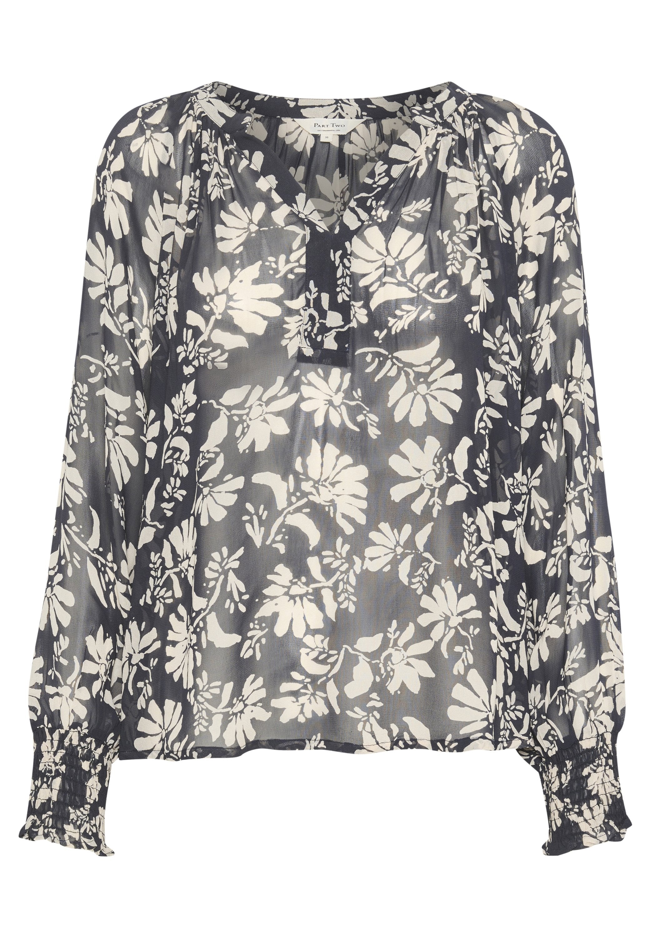 Bluse mit floralem Muster aus transparentem marineblauen Stoff, mit einem weißen Blumenmuster, gefältelten Bündchen und einem V-Ausschnitt. Leicht und locker geschnitten.