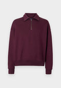 Bordeauxfarbenes Sweatshirt mit Reißverschlusskragen, langen Ärmeln, gerippten Bündchen und einer weichen Textur. Lässiges Design, ideal zum Drunterziehen.