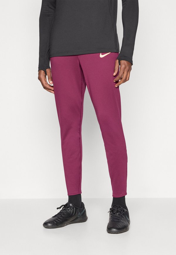 Nike Performance STRIKE PANT - Tracksuit bottoms - bordeaux/orange pulse