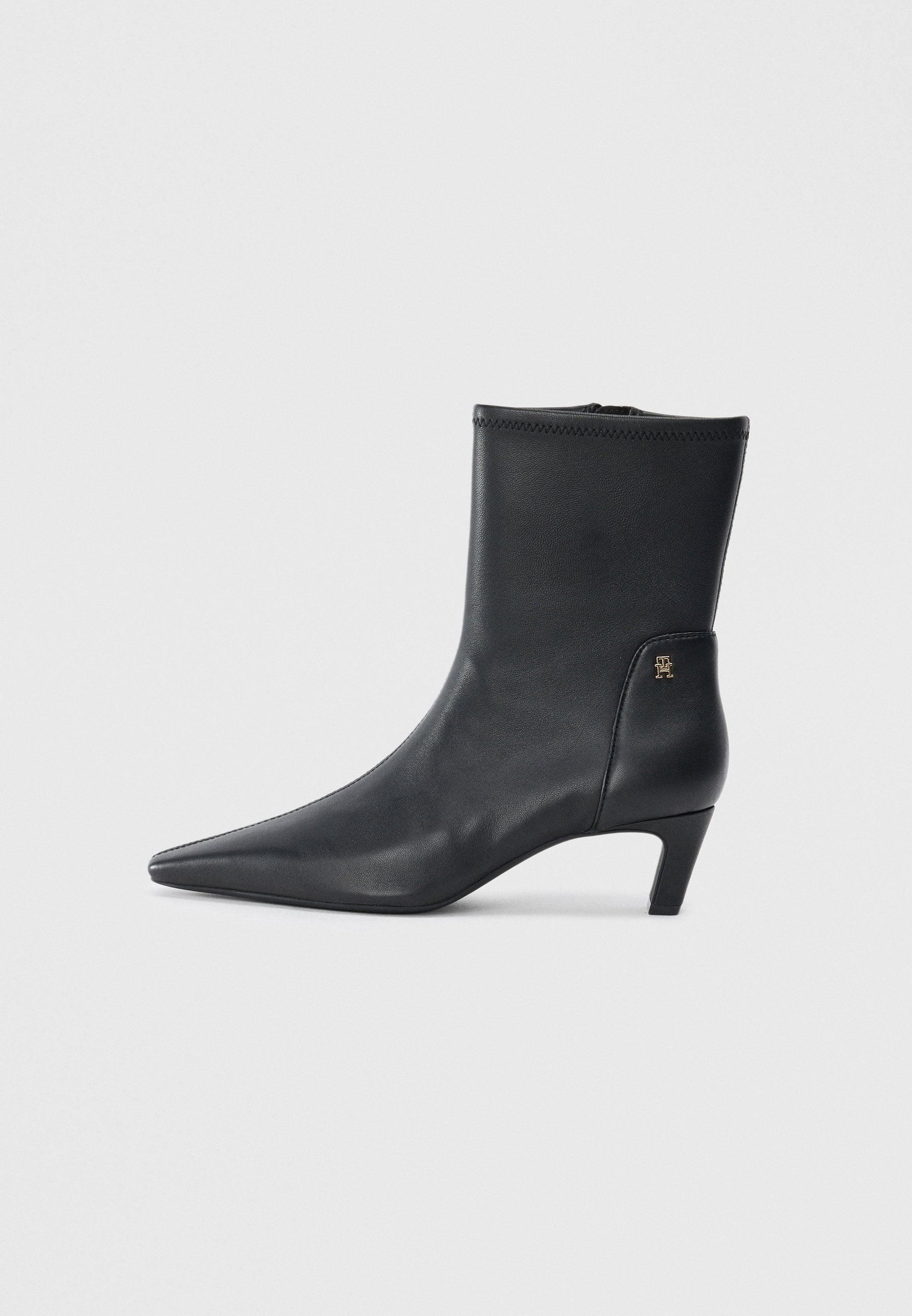 TH MONOGRAM PLAQUE LEATHER MID BOOTS Media 1