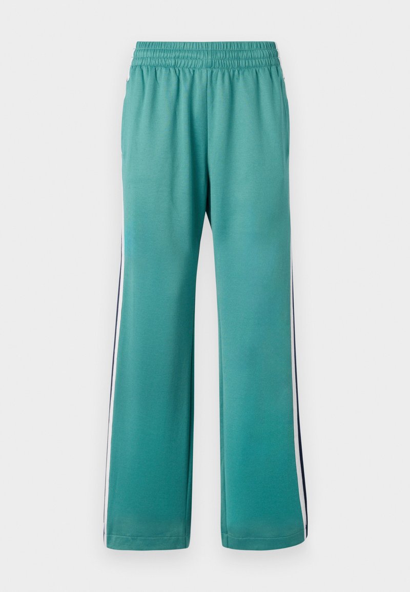 Türkise Sweatpants mit einem elastischen Bund, weitem Bein und seitlichen Streifen in Marineblau und Weiß. Glattes Material mit matter Oberfläche.
