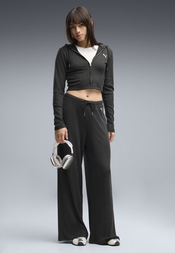 Puma ESSENTIALS RELAXED HOSE MIT WEITEM BEIN - Tracksuit bottoms - black