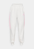 adidas Sportswear TIRO - Tracksuit bottoms - grey one/true pink