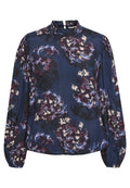 Dunkelbluse mit einem floralen Muster in Lila- und Cremetönen. Hat einen hohen, gerafften Ausschnitt und lange, geraffte Ärmel.