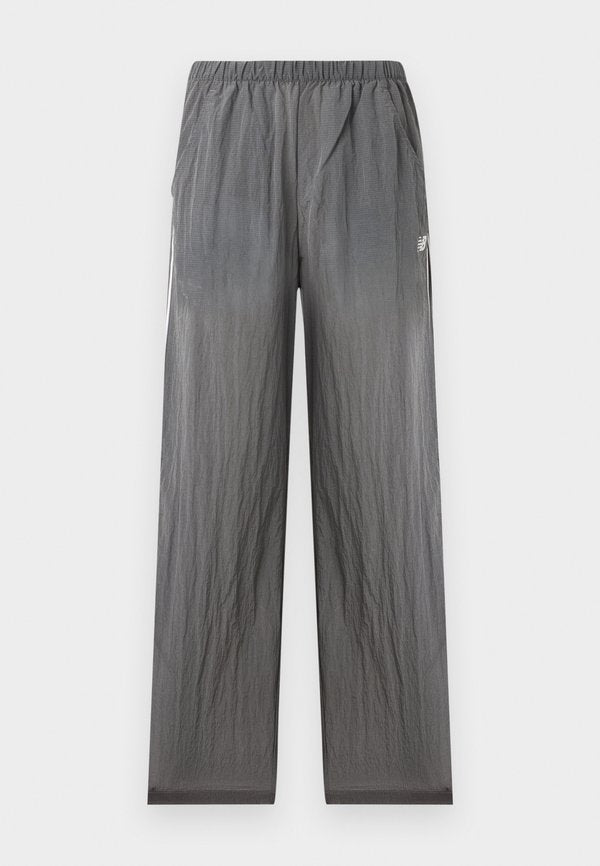 New Balance SPORT LEGACY - Tracksuit bottoms - castlerock