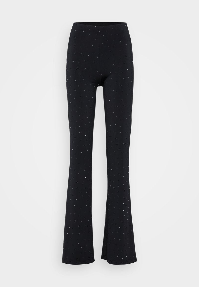 Schwarze, ausgestellte Hose mit einem dehnbaren Bund, verziert mit verstreuten silbernen Metallic-Punkten. Hergestellt aus einem glatten, weichen Stoff.
