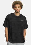 Under Armour ATHLETIC DEPARTMENT PRINTED HEAVYWEIGHT - Print T-shirt - black