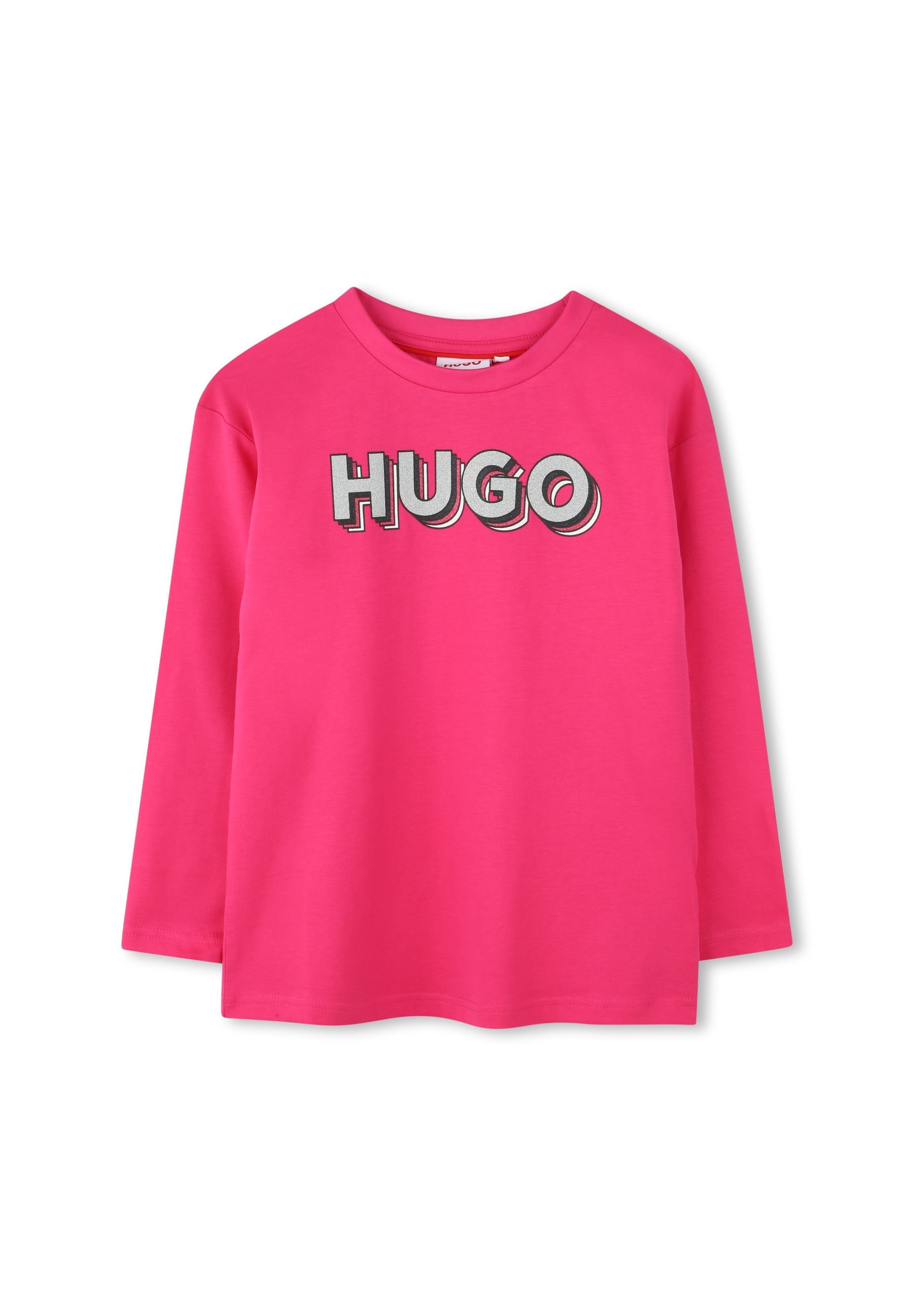 Langärmliges T-Shirt aus leuchtend pinkem Baumwollstoff mit dem Wort "HUGO" in fetter, grauer Umrandung über die Brust. Runder Ausschnitt.