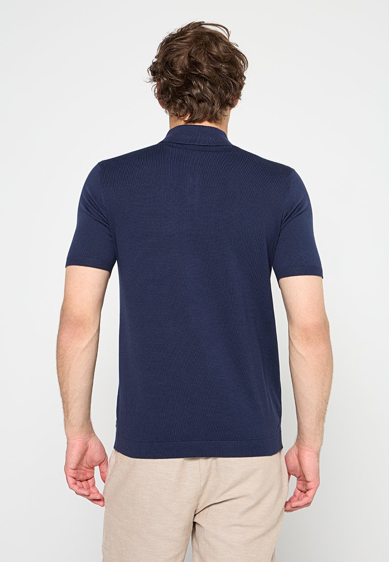 NO EXCESS Poloshirt Media 2