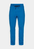Blaue Slim-Fit-Sweatpants mit schwarzem und weißem Kordelzug, schmal zulaufenden Beinen und sichtbaren Nähten an den Knien.