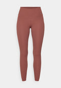 Leggings in einem rötlich-braunen Farbton aus dehnbarem Material. Mit einem hohen Bund und einem kleinen Markenlogo in der Nähe der Hüfte.