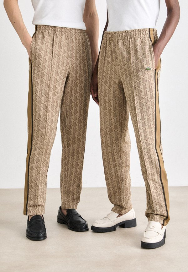 Lacoste UNISEX - Tracksuit bottoms - croissant/cookie