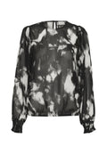 Schwarze und weiße transparente Bluse mit abstraktem Muster, langen Ärmeln, rundem Halsausschnitt, elastischen Bündchen und einer leichten Raffung am Saum.
