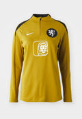 Gelbes Sportoberteil mit langen Ärmeln und Viertelreißverschluss, schwarzen Schulterakzenten, einem Löwenemblem auf der Brust und dem Nike-Logo auf der linken Schulter.