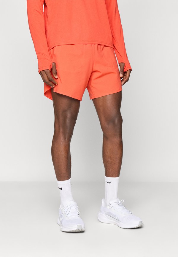 Nike Performance M NK DF STRIDE 7IN BF SHORT - Sports shorts - light crimson/reflective silver-coloured