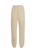 Beige Jogginghose mit elastischem Bund und Bündchen, mit weißem Text "The Future Surf Society" auf dem oberen linken Oberschenkel.