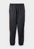 Nike Sportswear M NK WR LND PANT 26 - Tracksuit bottoms - black/team crimson