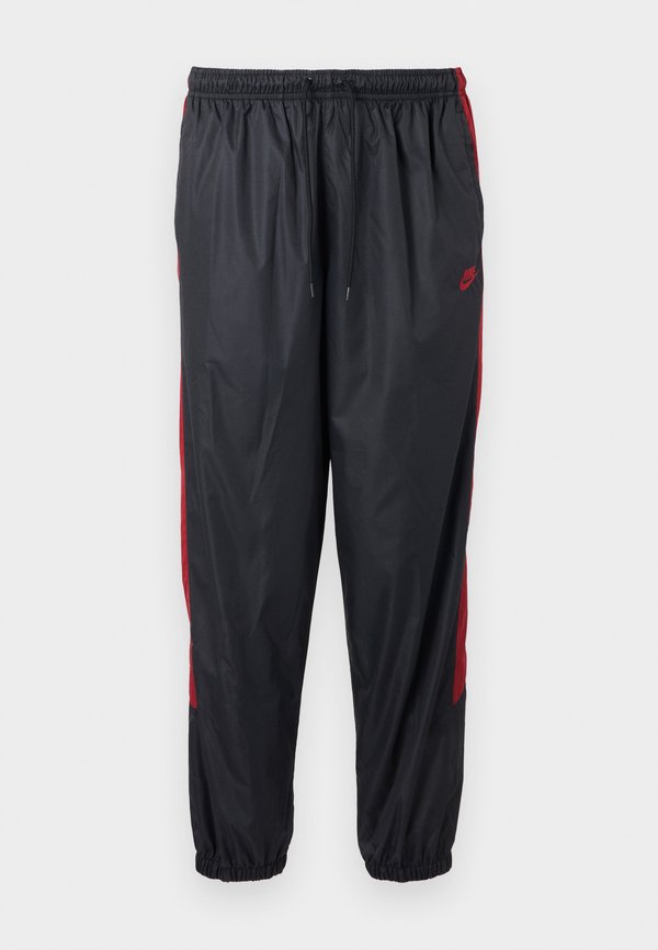 Nike Sportswear M NK WR LND PANT 26 - Tracksuit bottoms - black/team crimson