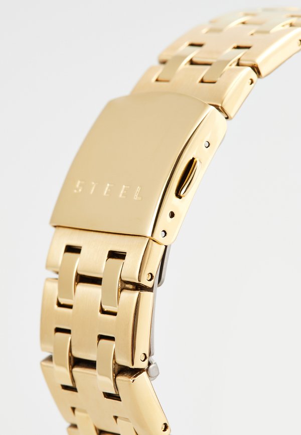 Guess TELESCOPE 0,005 CT. DIAMOND