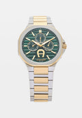 AIGNER Uhr mit einem achtkantigen Gehäuse aus silbernem und goldfarbenem Edelstahl, grünem strukturiertem Zifferblatt, goldenen Akzenten und einem Metallarmband.