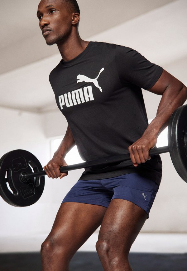Puma LOGO TEE - Print T-shirt - black
