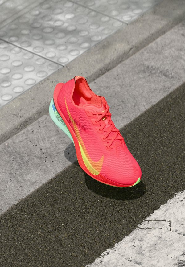Nike Performance VAPORFLY 4 - Road running shoes - bright crimson/lime blast/mint foam/cave purple/hyper orange/ember glow