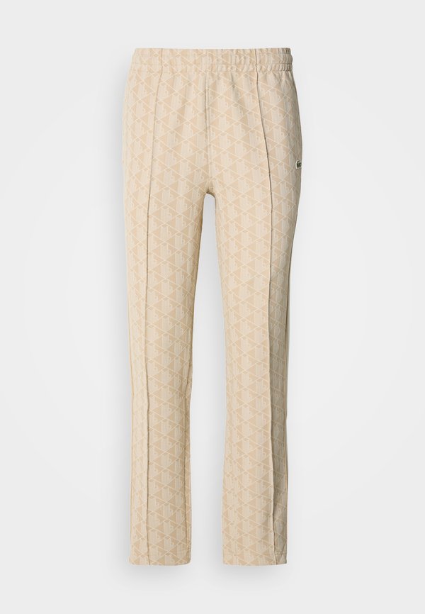 Lacoste UNISEX - Tracksuit bottoms - lionne/flour
