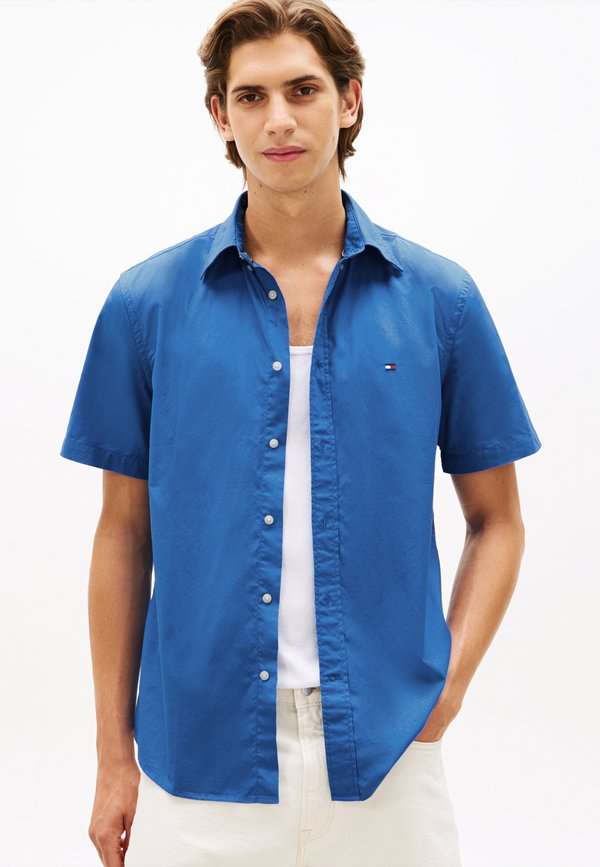 Tommy Hilfiger TH FLEX REGULAR FIT POPLIN SHORT SLEEVE SHIRT - Shirt - blue orbit