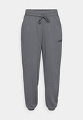 adidas Sportswear ESSENTIALS LINEAR CUFFED PANTS - Tracksuit bottoms - grey six/black